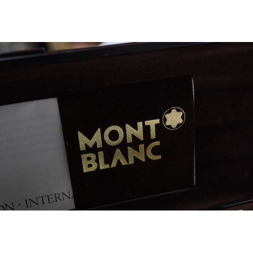 501 - Two Montblanc fountain pens and a Sheaffer fountain pen, in a Montblanc case. Condition - fair to go... 