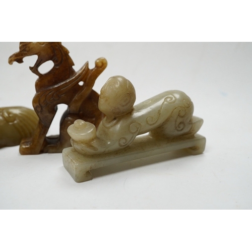 502 - Four Chinese jade carvings, of a horse, cicada, a winged beast, a kneeling man, and a horned beast, ... 