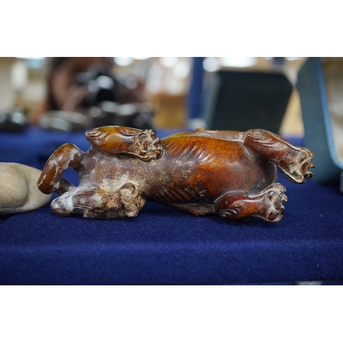 507 - Three Chinese archaistic jade carvings of a winged mythical beast, a duck and a horned seated beast,... 