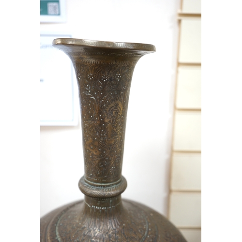 508 - A large Indian repoussé work brass vase, 62cm high. Condition - good