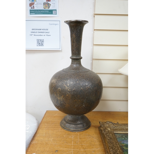 508 - A large Indian repoussé work brass vase, 62cm high. Condition - good