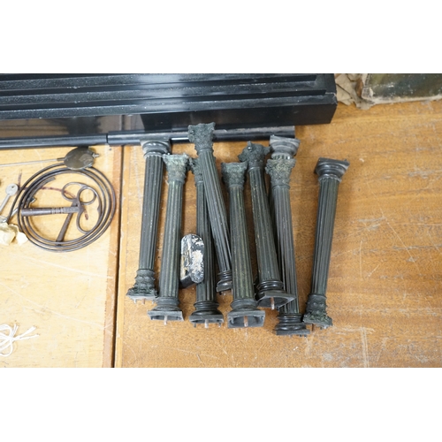 510 - A Victorian black slate mantel clock, 54.5cm wide. Condition - columns and some clock parts loose... 