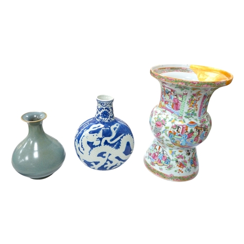 515 - A large 19th century Chinese famille rose vase, a green glazed pear-shaped vase, and a blue and whit... 