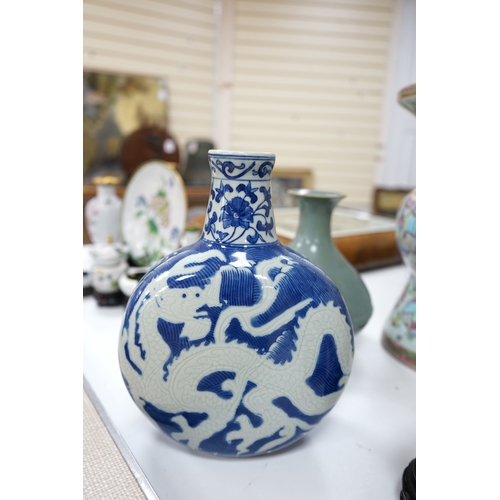 515 - A large 19th century Chinese famille rose vase, a green glazed pear-shaped vase, and a blue and whit... 