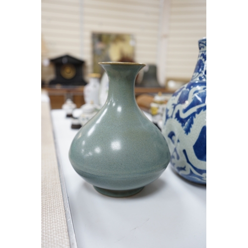 515 - A large 19th century Chinese famille rose vase, a green glazed pear-shaped vase, and a blue and whit... 