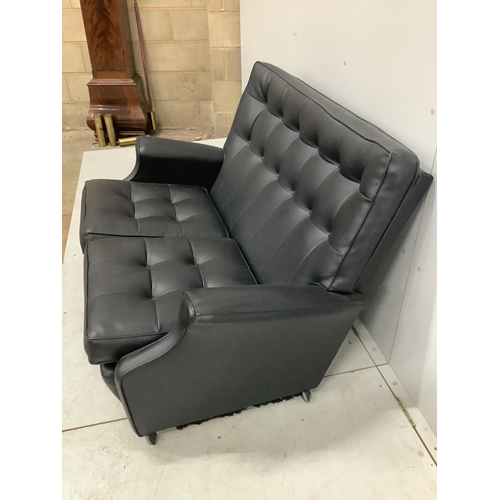 52 - A 1960's leatherette two seater settee, width 130cm, depth 70cm, height 83cm. Condition - fair to go... 