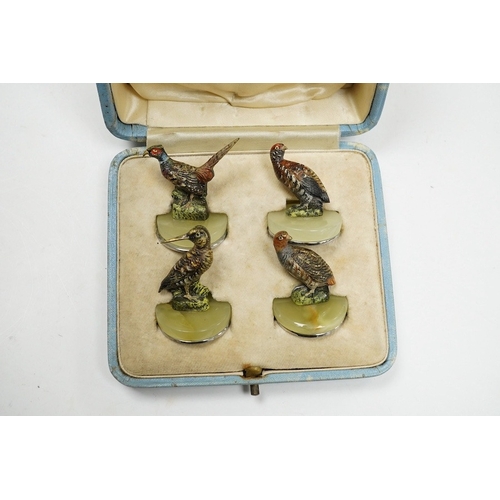 520 - A cased Asprey set of four cold painted bronze and chrome plated novelty game bird menu holders, tal... 