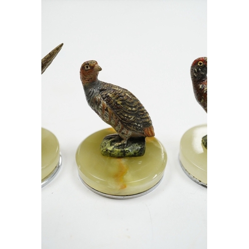 520 - A cased Asprey set of four cold painted bronze and chrome plated novelty game bird menu holders, tal... 