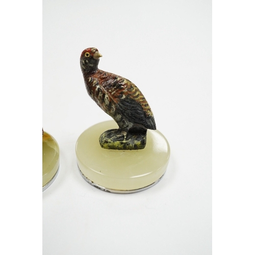 520 - A cased Asprey set of four cold painted bronze and chrome plated novelty game bird menu holders, tal... 