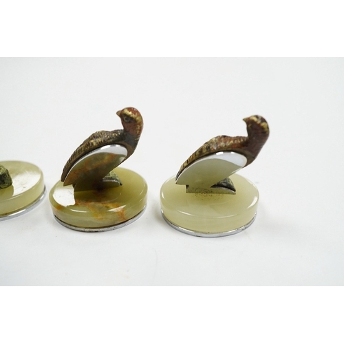 520 - A cased Asprey set of four cold painted bronze and chrome plated novelty game bird menu holders, tal... 