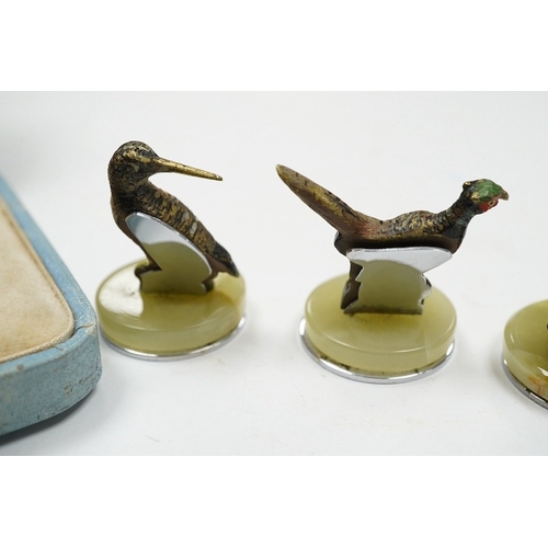 520 - A cased Asprey set of four cold painted bronze and chrome plated novelty game bird menu holders, tal... 