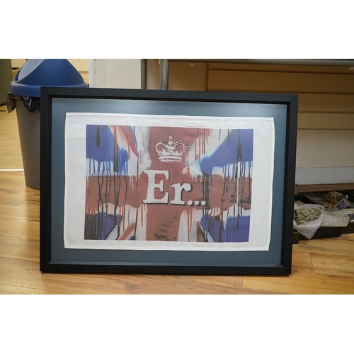 530 - BANKSY, ER Tea Towel, framed and glazed. 88.5 x 67 cm overall. Condition - good