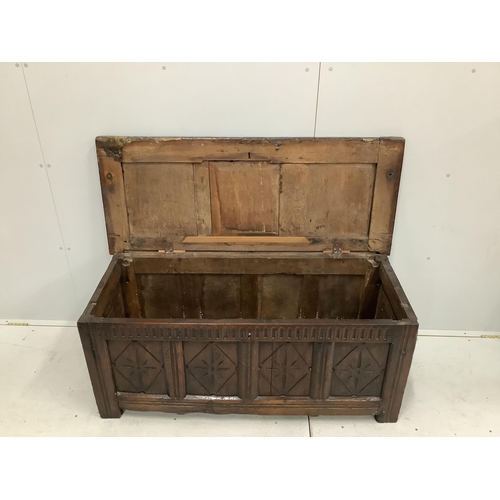 62 - An early 18th century and later oak coffer, width 132cm, height 58cm. Condition - poor