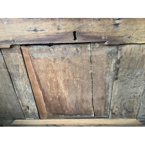 62 - An early 18th century and later oak coffer, width 132cm, height 58cm. Condition - poor