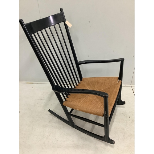 7 - A Hans Weger J16 model rocking chair, width 61cm, depth 47cm, height 109cm. Condition - fair