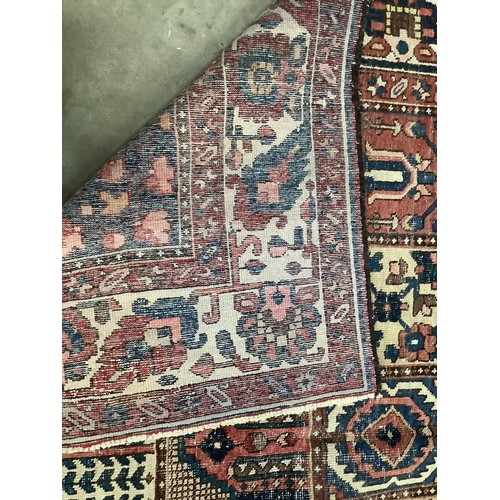 72 - A Baktiari carpet, 320 x 215cm. Condition - poor to fair, worn in several places