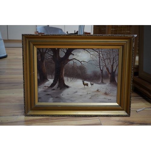 765 - H E Austin, oil on canvas, Snowy winter landscape with two deer, signed, 27 x 40cm. Condition - good... 