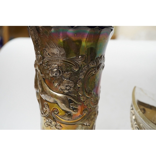 826 - An Edwardian silver vase, embossed with hunting scene, with blue glass liner, Manoah Rhodes & Sons L... 