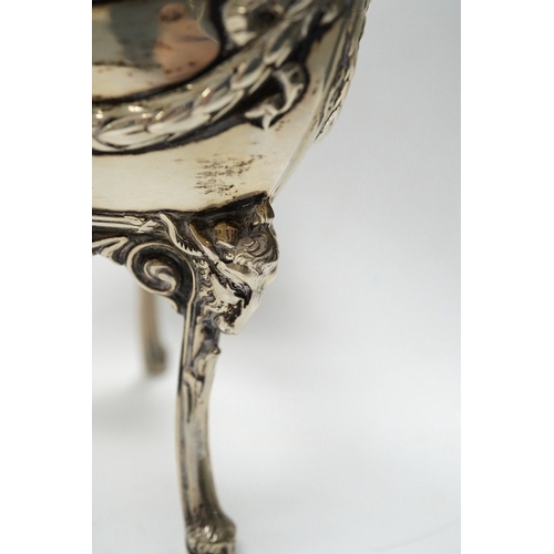 826 - An Edwardian silver vase, embossed with hunting scene, with blue glass liner, Manoah Rhodes & Sons L... 