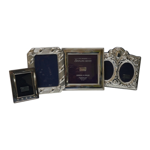 829 - A modern boxed Carr's of Sheffield, silver mounted double photograph frame, width 18.3cm, together w... 