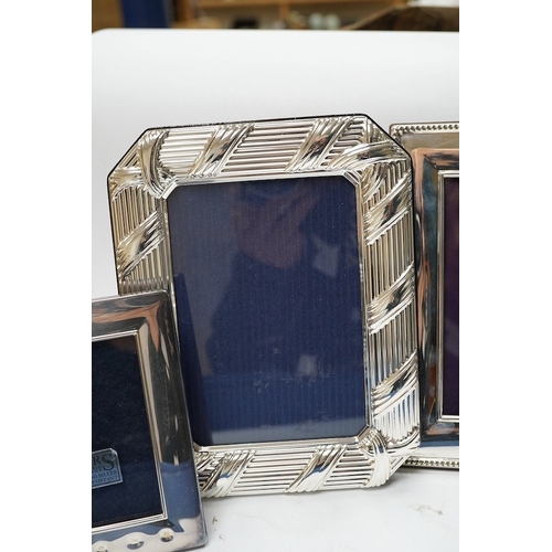 829 - A modern boxed Carr's of Sheffield, silver mounted double photograph frame, width 18.3cm, together w... 