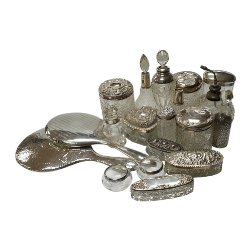 832 - Two silver mounted hand mirrors and a collection of seventeen assorted silver mounted toilet jars. C... 