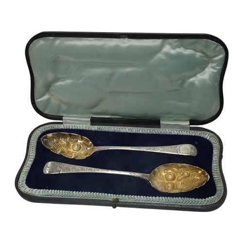 836 - A cased pair of George III silver Old English pattern 'berry' spoons, by Joseph Ash I, London, 1810,... 