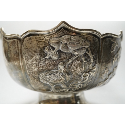 840 - A late 19th/early 20th century Chinese white metal pedestal bowl, decorated with birds and foliage, ... 