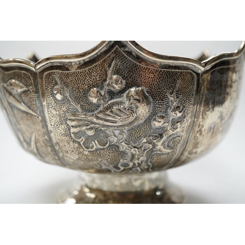 840 - A late 19th/early 20th century Chinese white metal pedestal bowl, decorated with birds and foliage, ... 