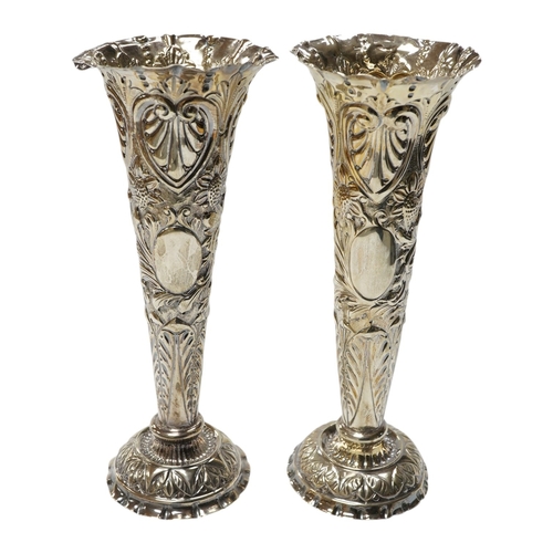 842 - A pair of late Victorian repousse silver trumpet vase, Charles Boyton II, London, 1892/3, 20.3cm, we... 