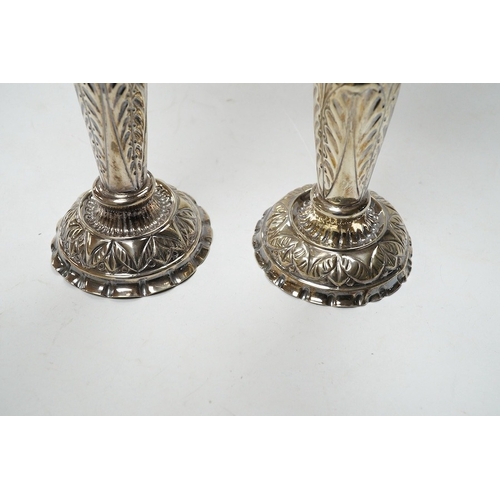 842 - A pair of late Victorian repousse silver trumpet vase, Charles Boyton II, London, 1892/3, 20.3cm, we... 