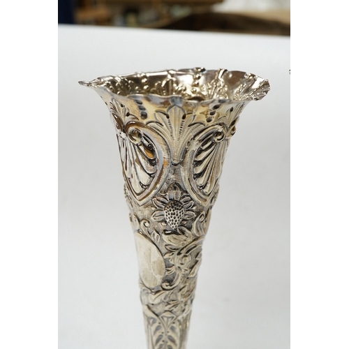 842 - A pair of late Victorian repousse silver trumpet vase, Charles Boyton II, London, 1892/3, 20.3cm, we... 