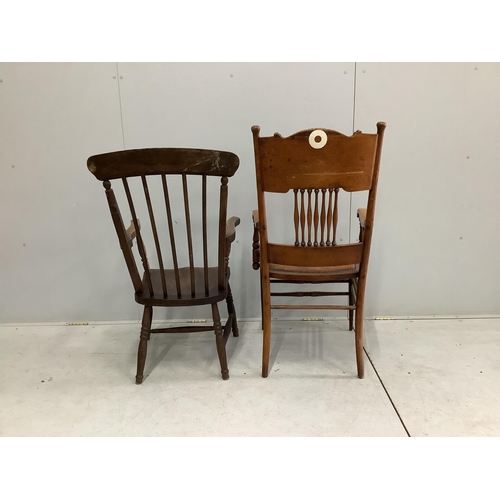 88 - A Victorian Windsor comb back armchair, reduced and an early 20th century American oak elbow chair, ... 