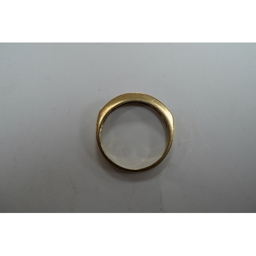 908 - A modern 9ct gold and channel set sapphire and diamond set half hoop ring, size N/O, gross weight 2.... 