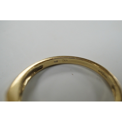 908 - A modern 9ct gold and channel set sapphire and diamond set half hoop ring, size N/O, gross weight 2.... 