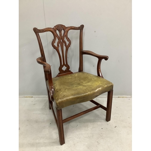 91 - A set of eight reproduction Chippendale style mahogany dining chairs with green leather seats, two w... 