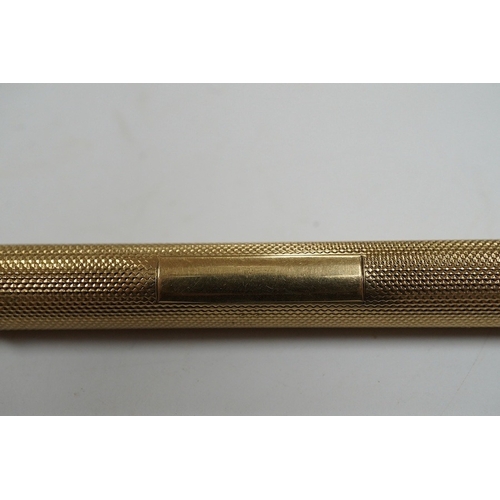 911 - A George V 9ct gold cased propelling pencil by Sampson Mordan & Co, London, 1928. Condition - fair t... 