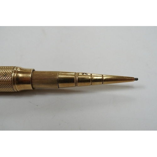 911 - A George V 9ct gold cased propelling pencil by Sampson Mordan & Co, London, 1928. Condition - fair t... 