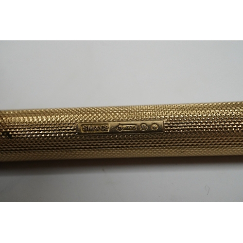 911 - A George V 9ct gold cased propelling pencil by Sampson Mordan & Co, London, 1928. Condition - fair t... 