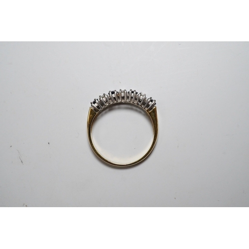 919 - A modern 18ct gold, four stone sapphire and three stone diamond set half hoop ring, size L/M, gross ... 