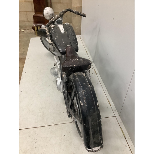 92 - A wooden Harley Davidson, possibly an advertising piece, length 220cm. Condition - poor