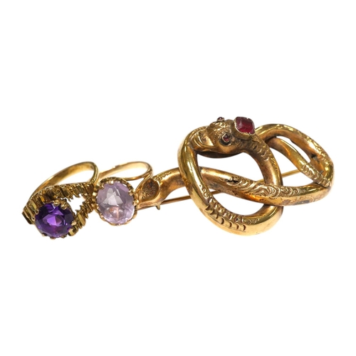 921 - A Victorian yellow metal and gem set coiled serpent brooch, 47mm, together with two 1960's 9ct gold ... 