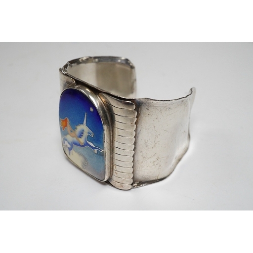 922 - A modern Macy's of New York sterling and polychrome enamel 'Grain of Sand' bangle, gross 83 grams. C... 