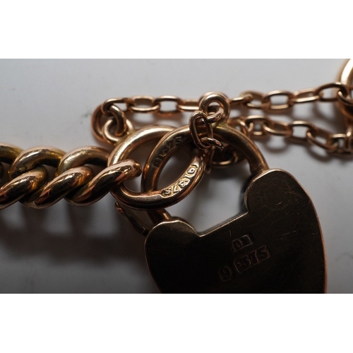 926 - A 9ct god curb link bracelet, with heart shaped padlock clasp, 18cm, 13.8 grams. Condition - fair to... 