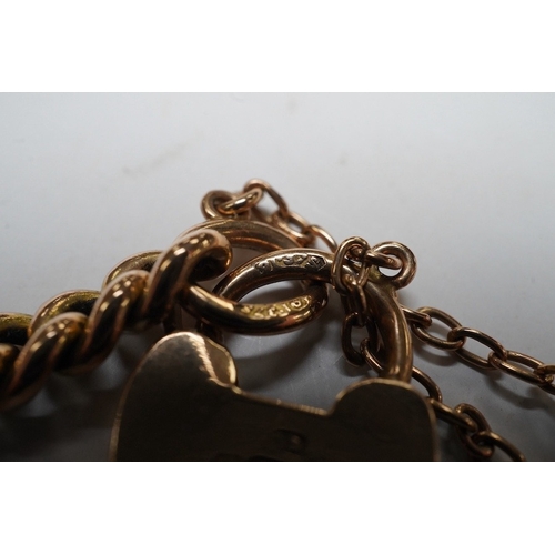 926 - A 9ct god curb link bracelet, with heart shaped padlock clasp, 18cm, 13.8 grams. Condition - fair to... 