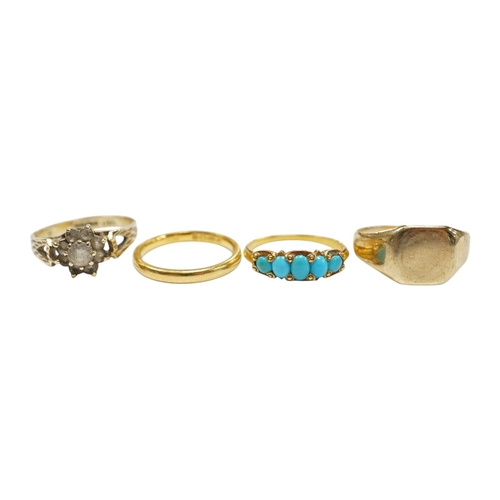 927 - Four assorted rings, including a 22ct gold wedding band, 3.2 grams, two 9ct gold rings including a s... 