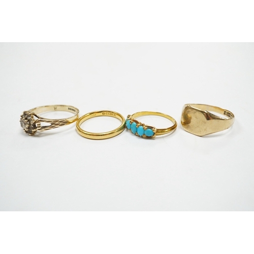 927 - Four assorted rings, including a 22ct gold wedding band, 3.2 grams, two 9ct gold rings including a s... 