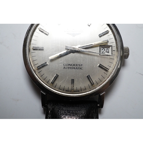 930 - A gentleman's stainless steel Longines Conquest Automatic wrist watch, on an associated leather stra... 