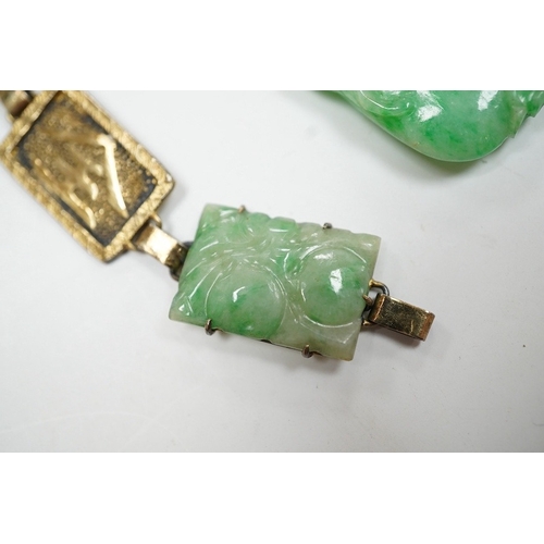 935 - A Chinese gilt white metal and carved jade panel set bracelet, a.f, 17.5cm, together with a carved j... 