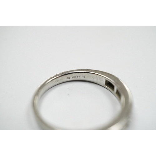 936 - A modern platinum and fifteen stone channel set baguette cut diamond set half hoop ring, size J, gro... 